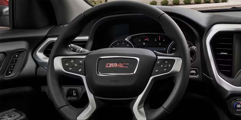 2023 GMC Acadia at Doug Henry Chevrolet GMC steering wheel